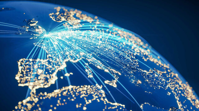 Digital view of Earth from above with sparkling city lights and interconnected blue lines