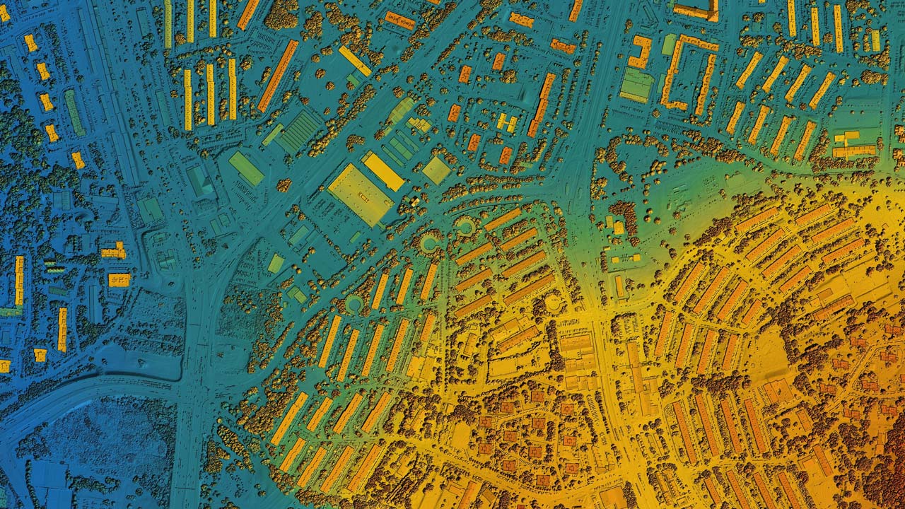 Aerial, geospatial data view of a semi-urban area with buildings, roads, and junctions
