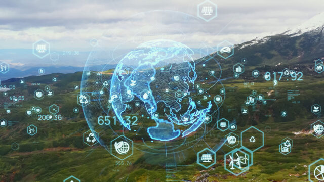 Abstract global climate change solution concept, depicting a globe overlaid over a field with a mountain