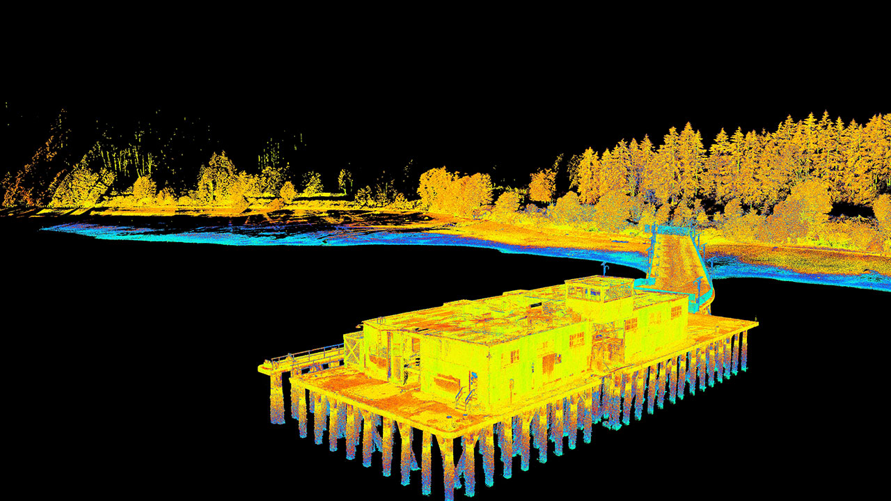 Black background with yellow and orange point cloud of a building