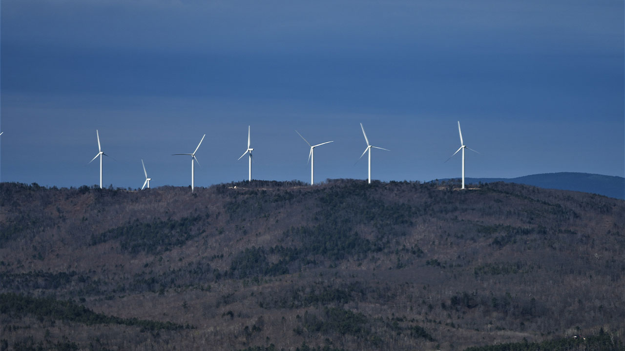 Western view of Canton Mountain Wind while conducting an eagle aerial nest survey from a helicopter