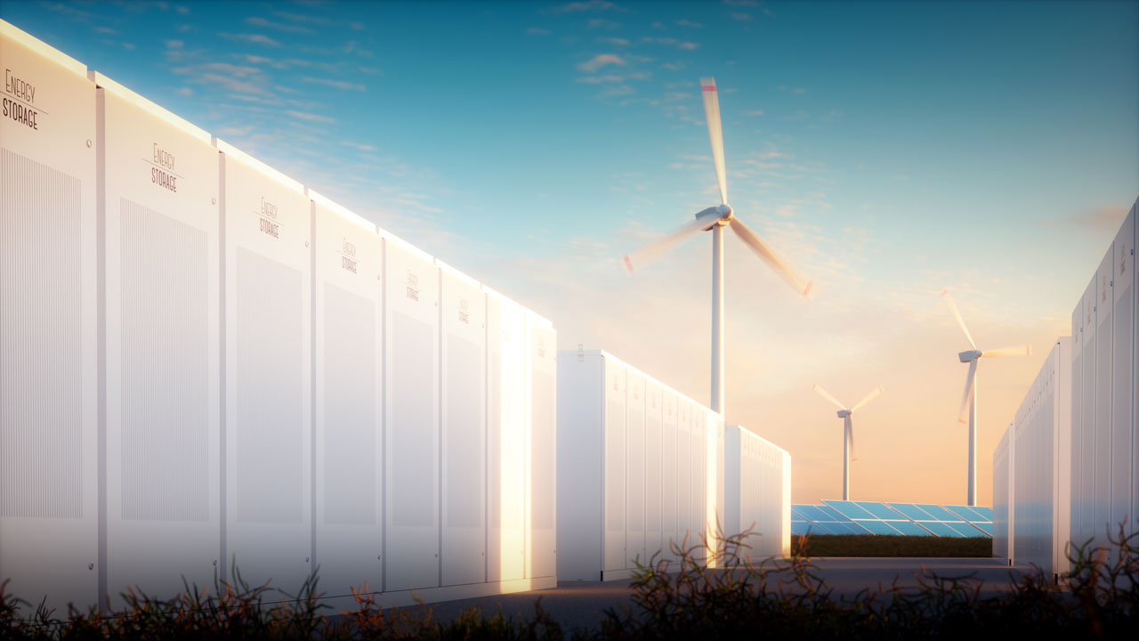 Battery storage system alongside windmills and an array of solar panels