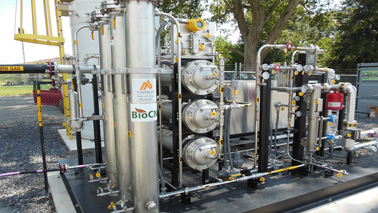 Angled view of a BioCNG system that converts biogas into an RNG suitable for use as vehicle fuel