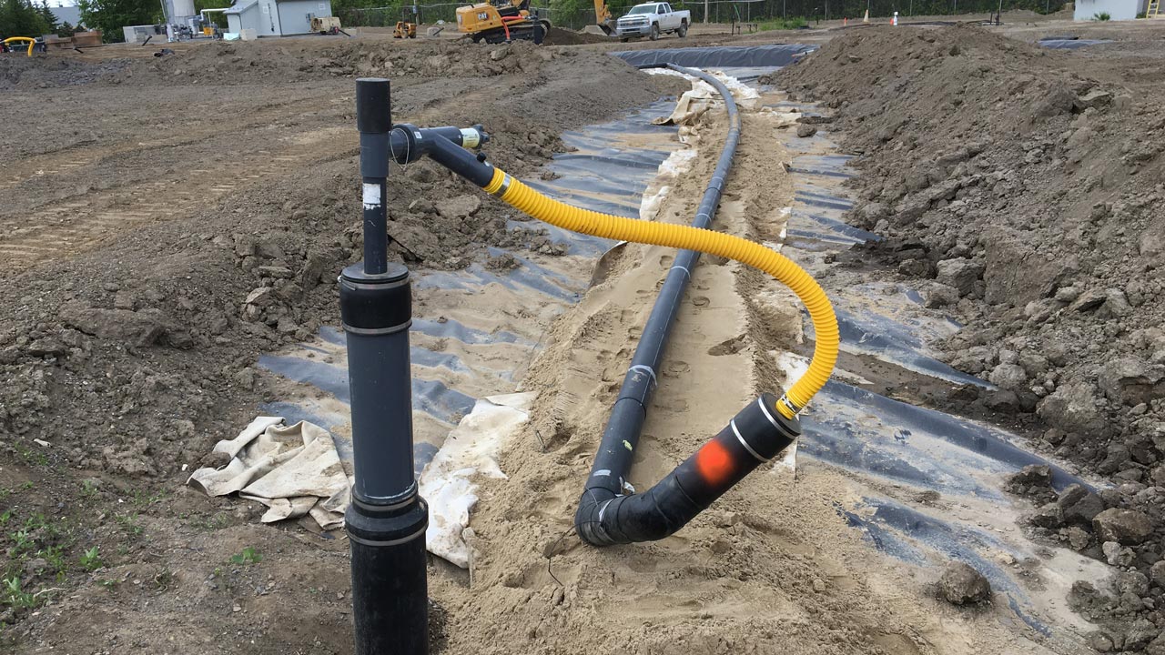 Landfill gas well head and conveyance piping