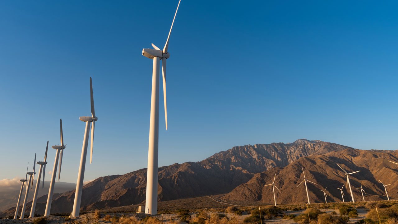 Wind farm in a mountainous area, an example of Tetra Tech's clean energy consulting and electric utility advisory services