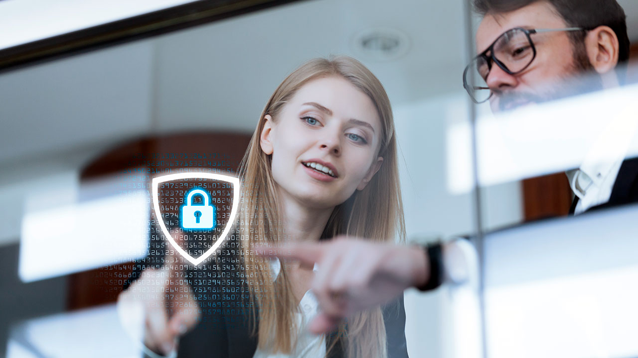 Two people pointing at floating digital padlock