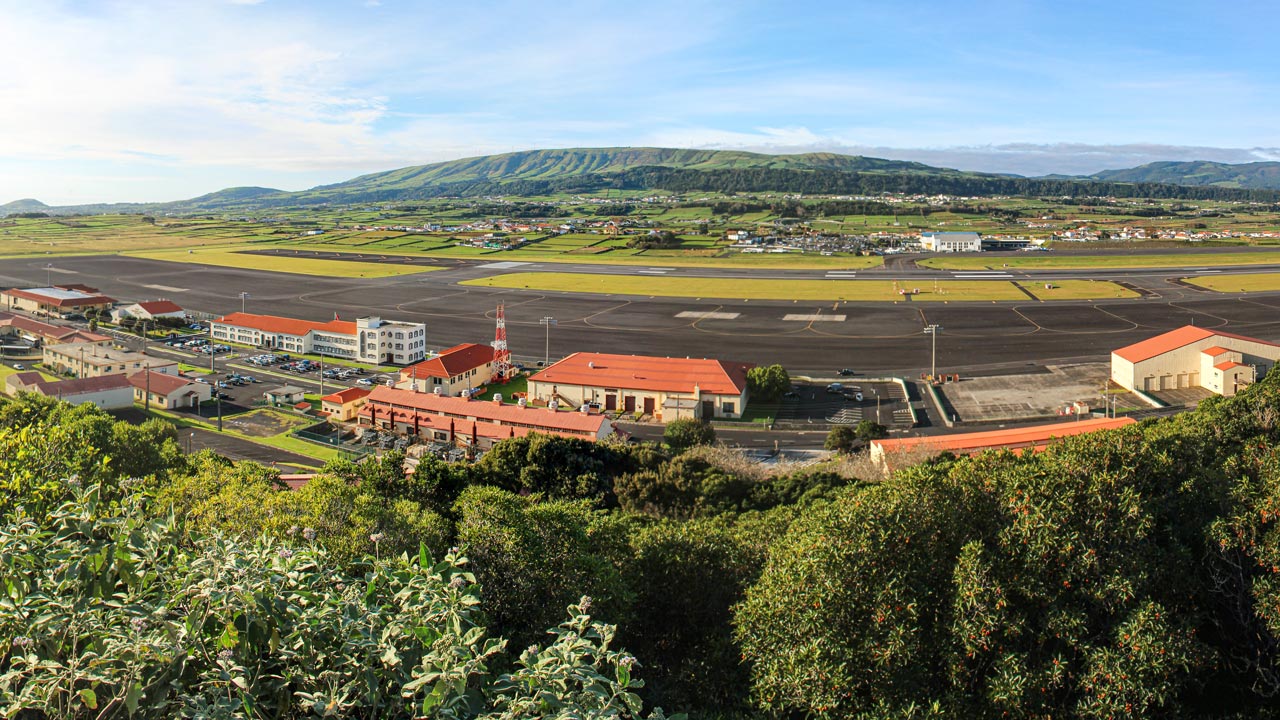 View of Lajes Field in Azores, Portugal, with mountains in the background