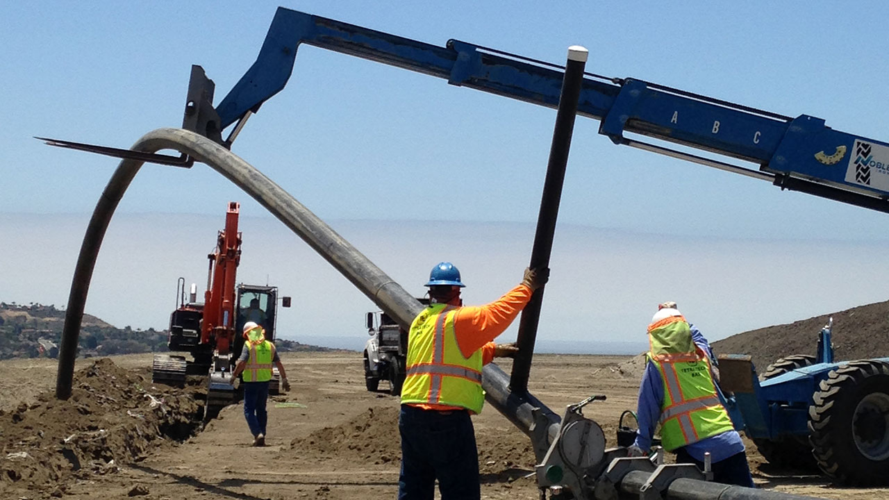 Employees working on a material recovery facility