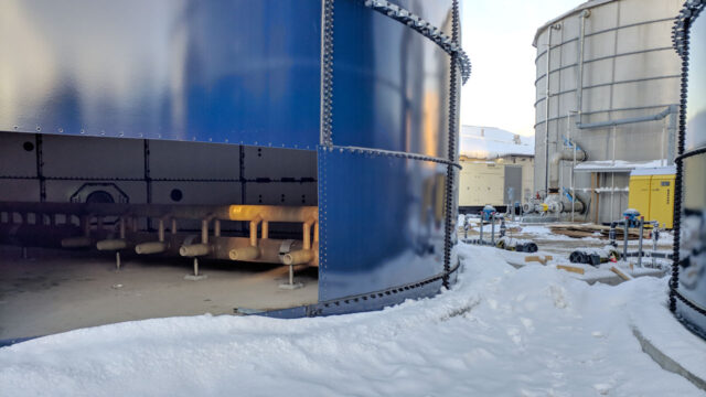 View of a leachate treatment plant with snow on the ground