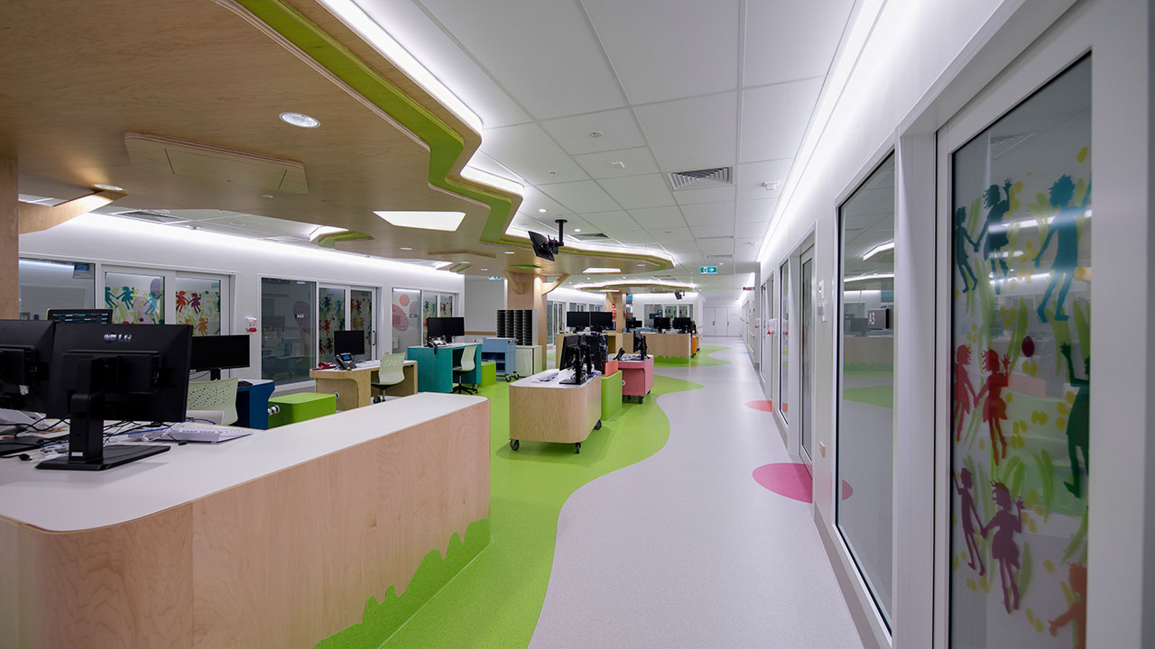 A colorful hospital ward common area