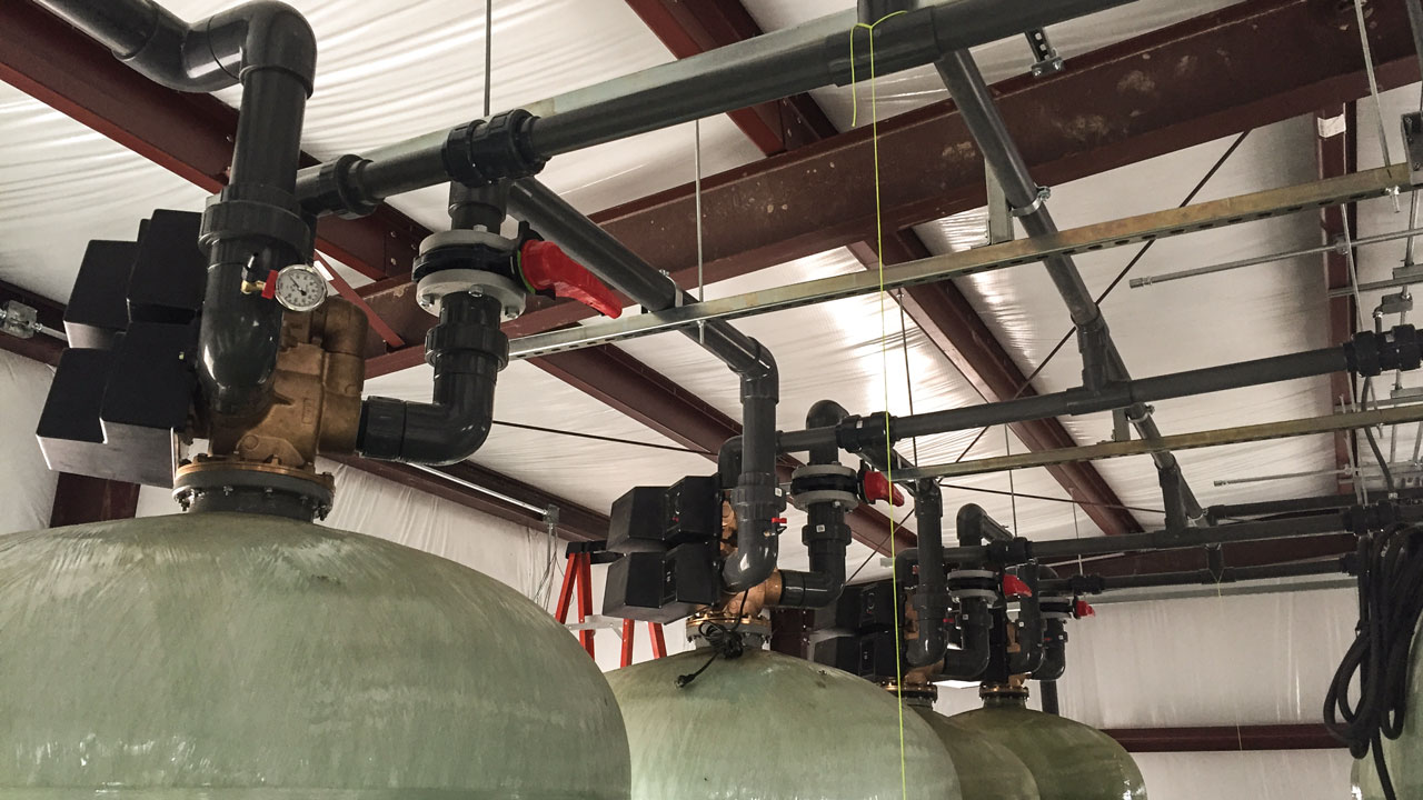 Leachate extraction and treatment system at an inactive landfill