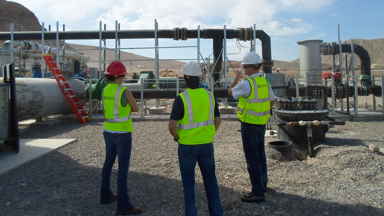 Tetra Tech engineers evaluating steps to get a client’s site ready for a beneficial-use project