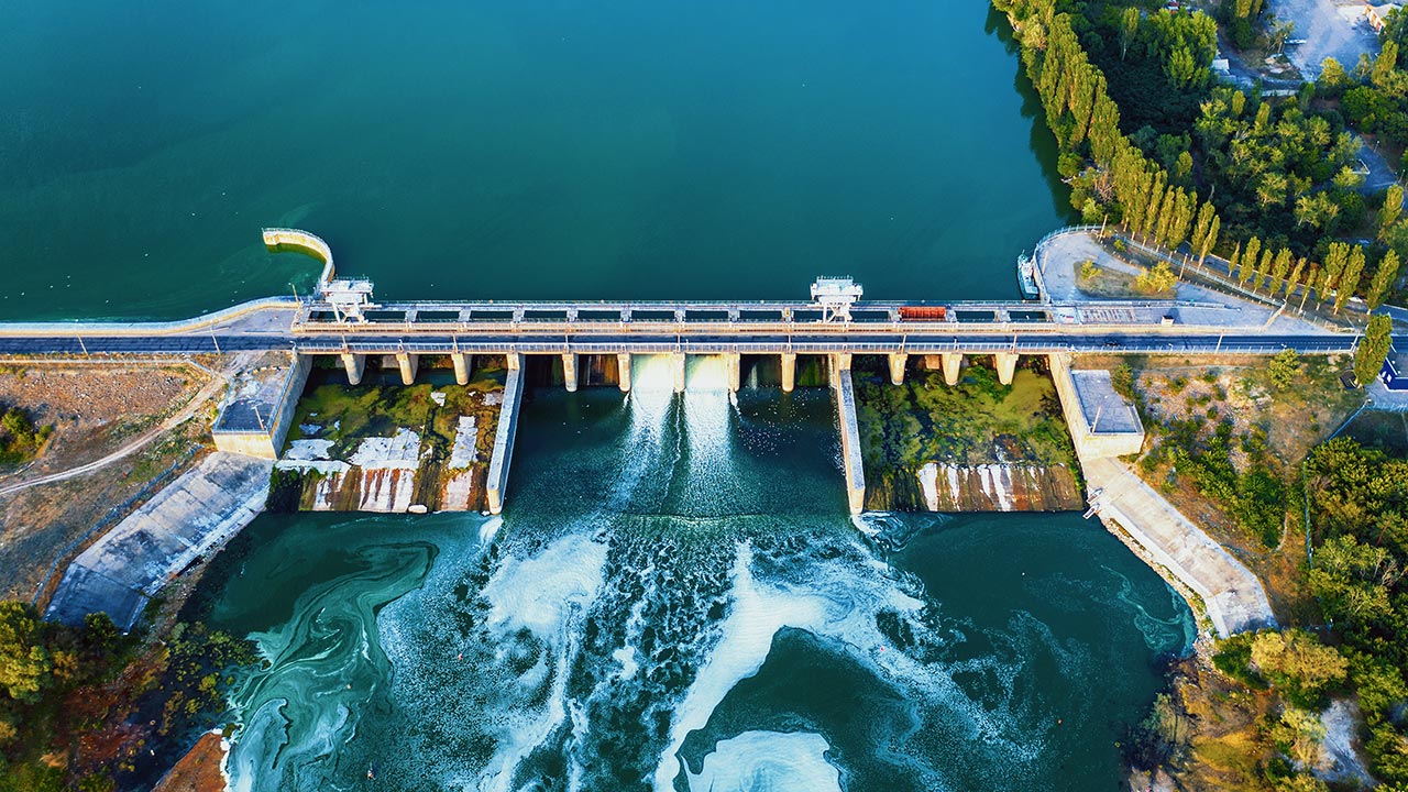 Aerial view of dam with flowing water