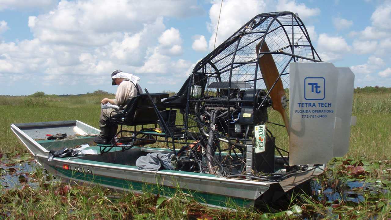 David Bressler fills in data sheets aboard a Tetra Tech airboat in Florida