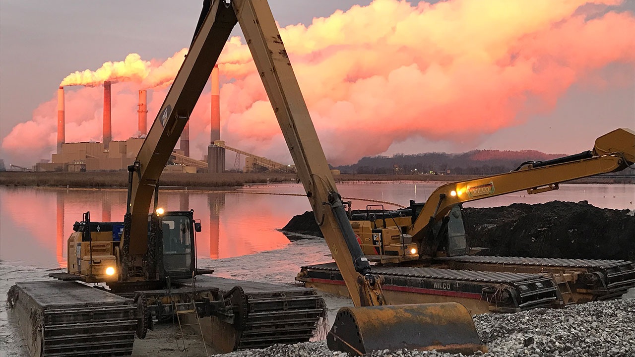 Floating excavators at Kentucky Utilities CCR site in Ghent, Kentucky