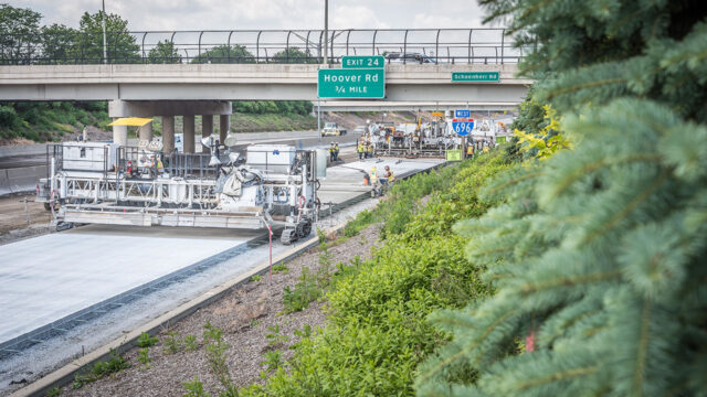 I-696 paving in area constrained by bridges and median outside barrier wall