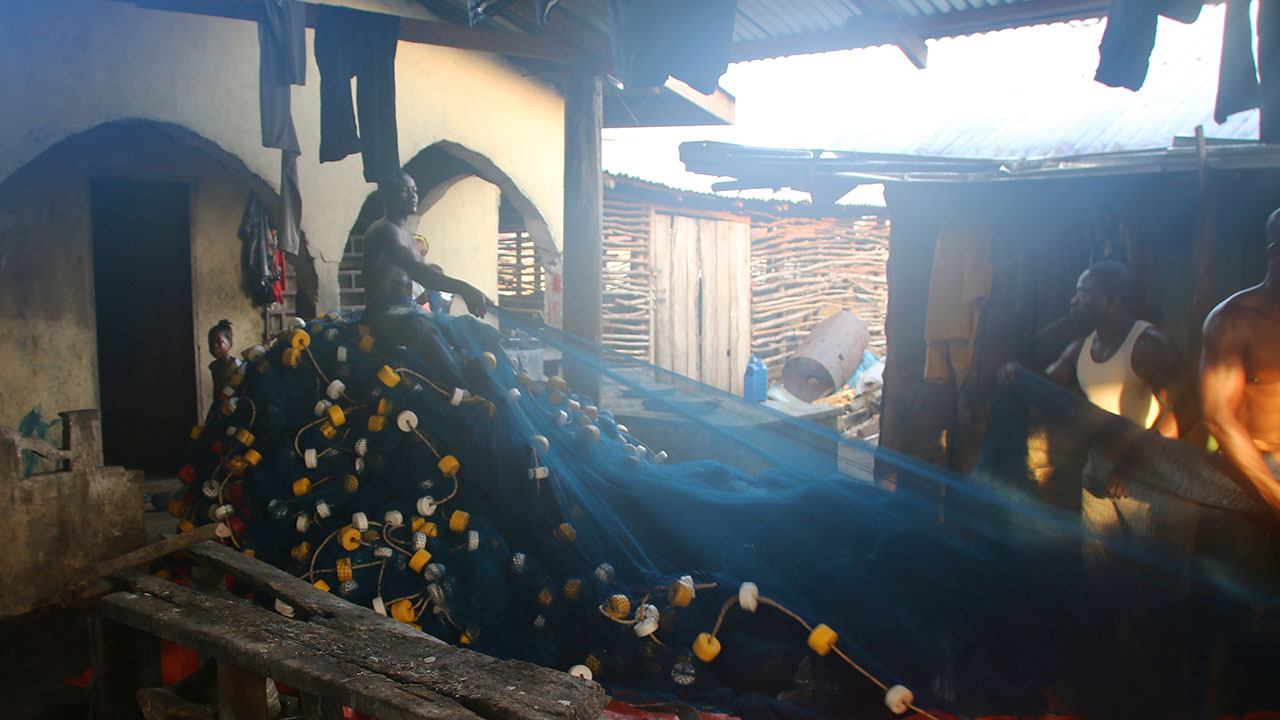 Artisanal small pelagic fishing nets being dried where Tetra Tech is inspecting gear between fishing excursions