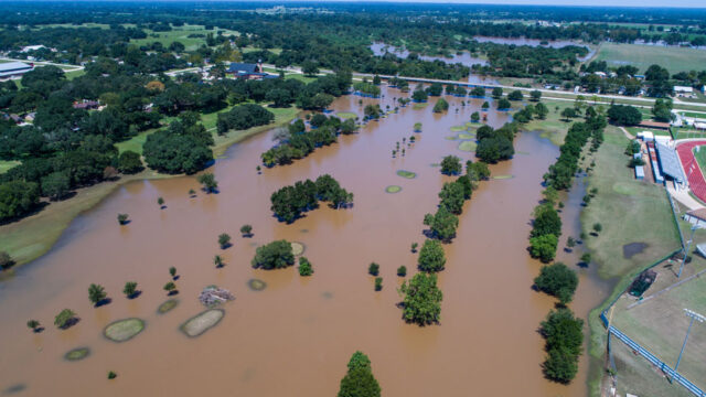 Large-scale flooding in an urban area of the United States submerges streets and impacts infrastructure