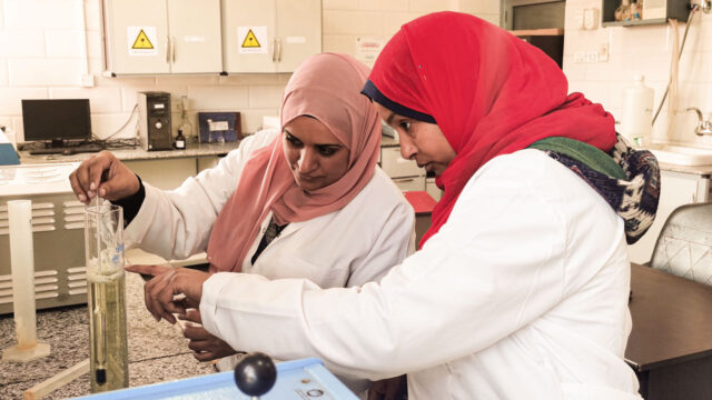 Tetra Tech chemists in a laboratory in Upper Egypt examine water samples to ensure the quality of produced water