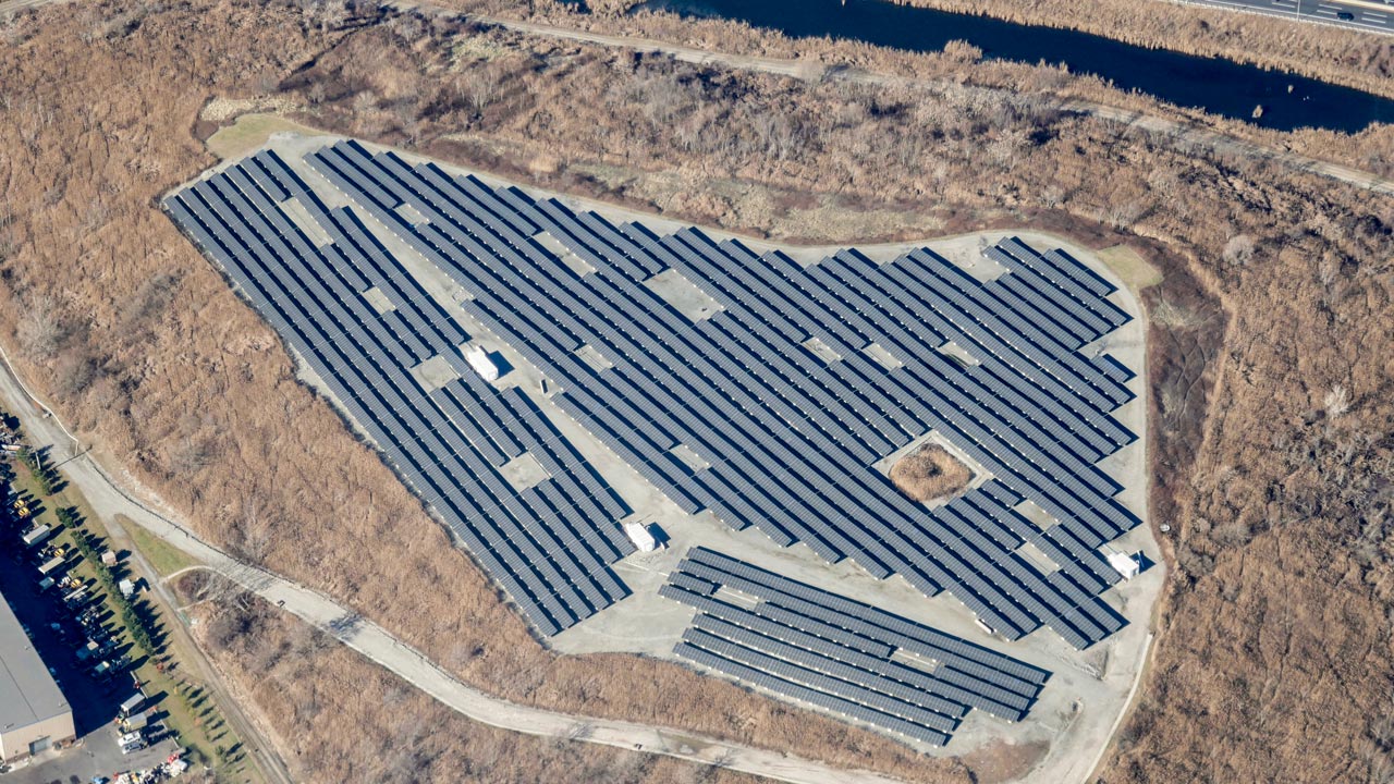 Aerial view of solar panels on a landfill