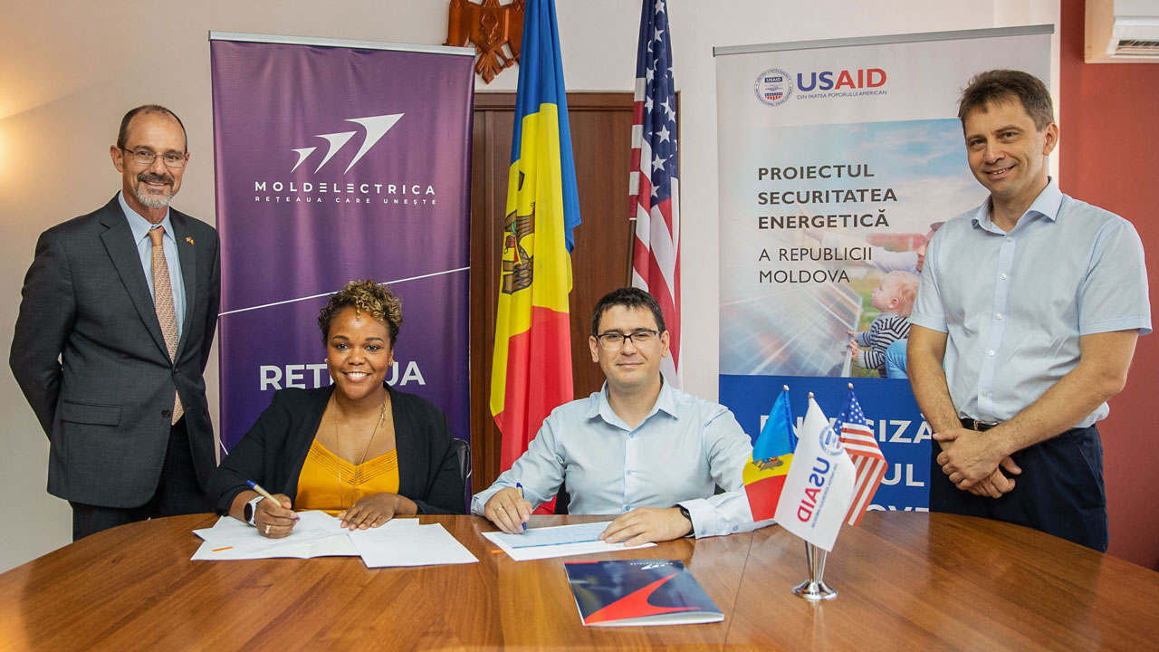 Representatives from Tetra Tech and Moldelectrica sign a cooperation agreement related to the donation of drones to monitor power lines