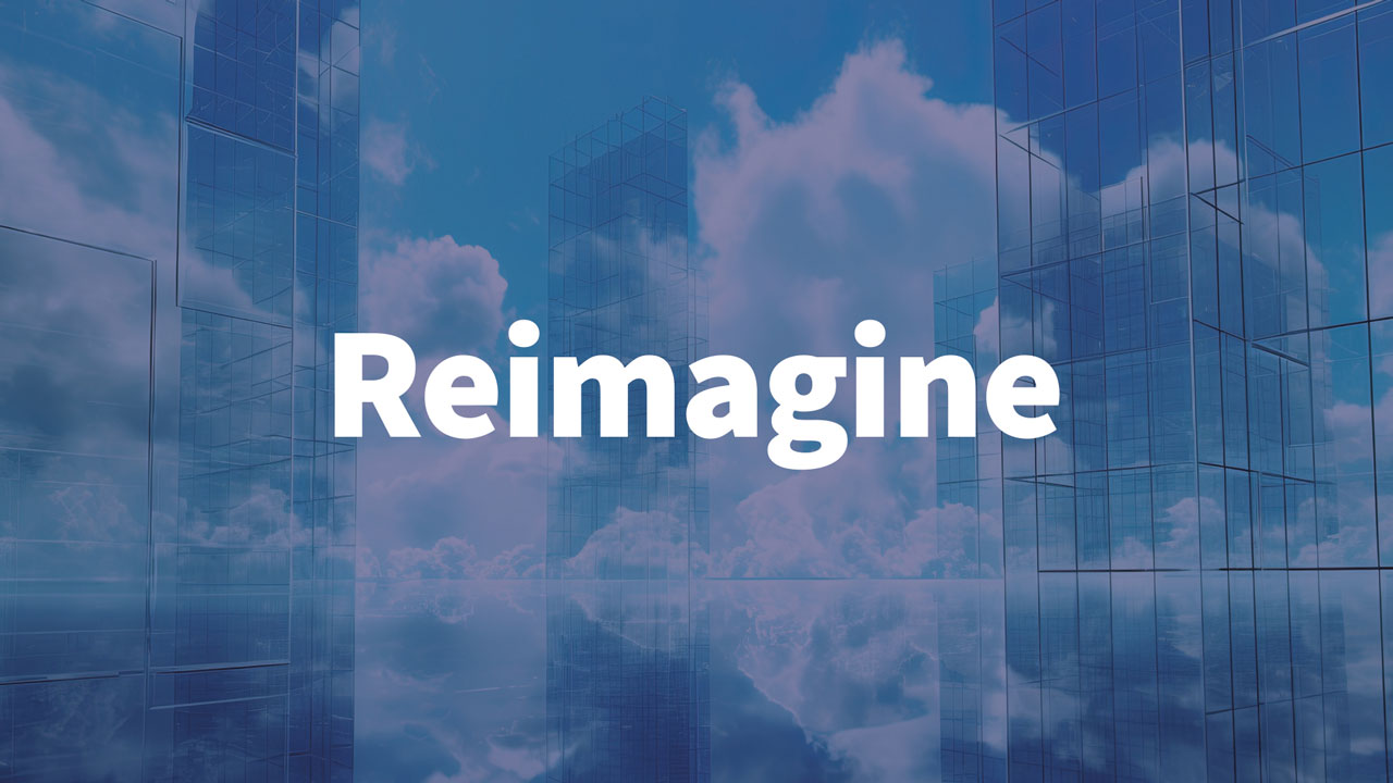The word “reimagine” over a background with buildings touching the clouds