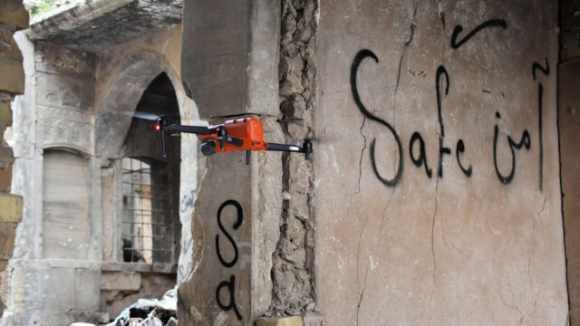 A drone piloted by Tetra Tech scanning a damaged building for improvised explosive devices (IEDs)