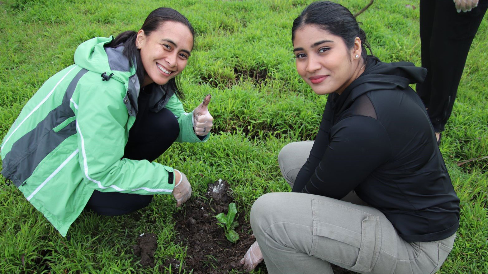 Two of Tetra Tech’s Fiji team members participate in the tree planting campaign