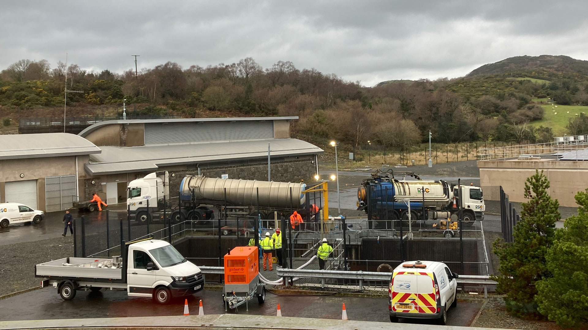 Workers outside a water treatment plant on Drumaroad in Northern Ireland