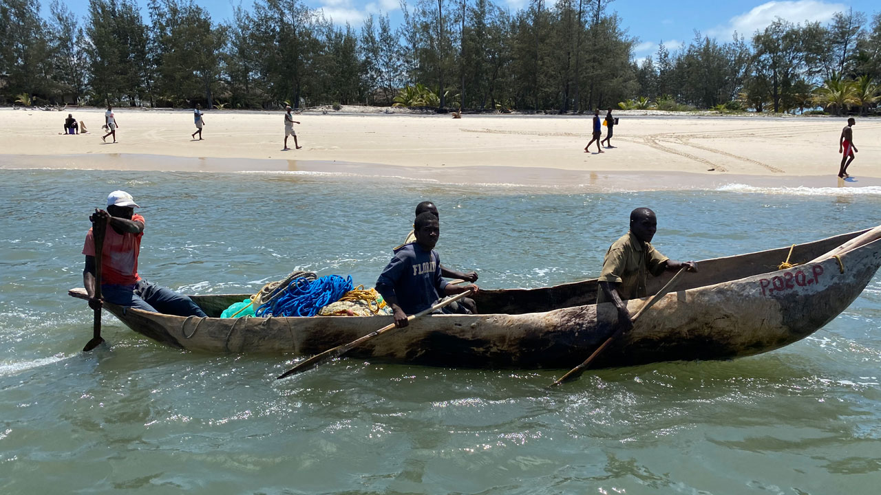 Fishermen on a boat offshore in Zambezia