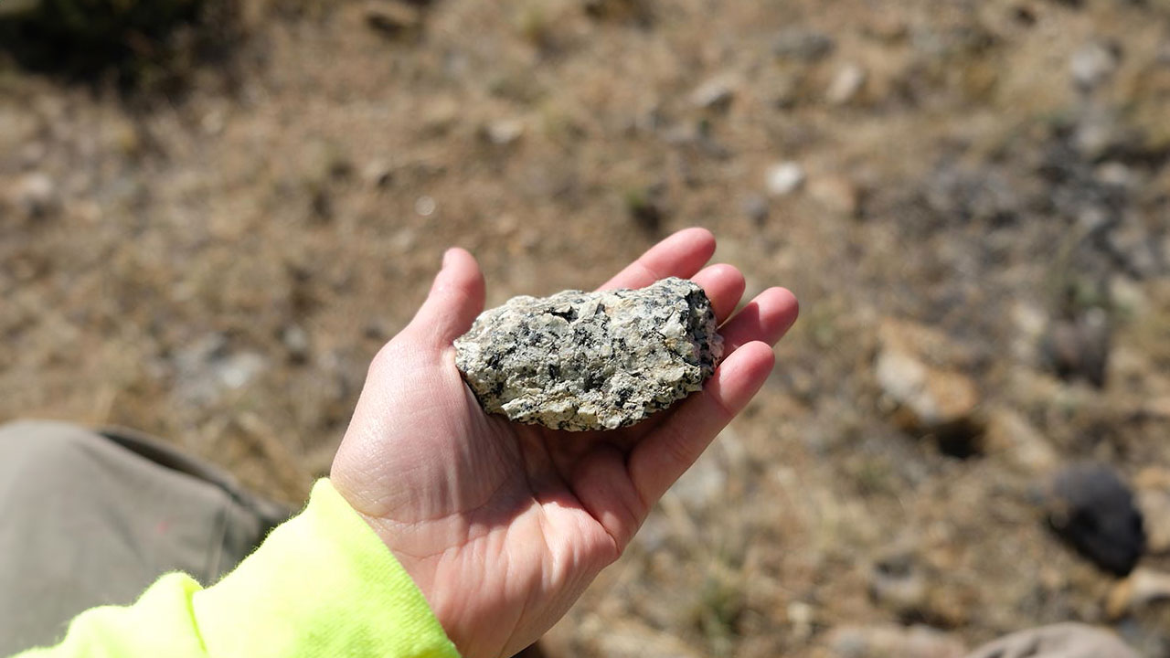 Metal ore held in a hand