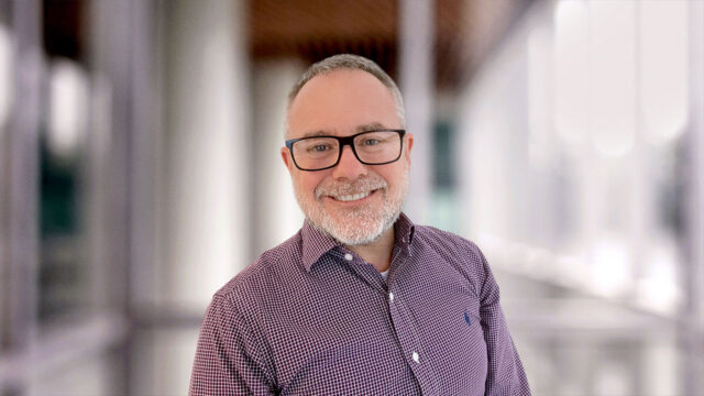 Headshot of Kev Thomas