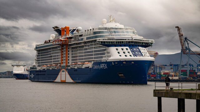 A large cruise ship arriving at the port in Belfast, Northern Ireland