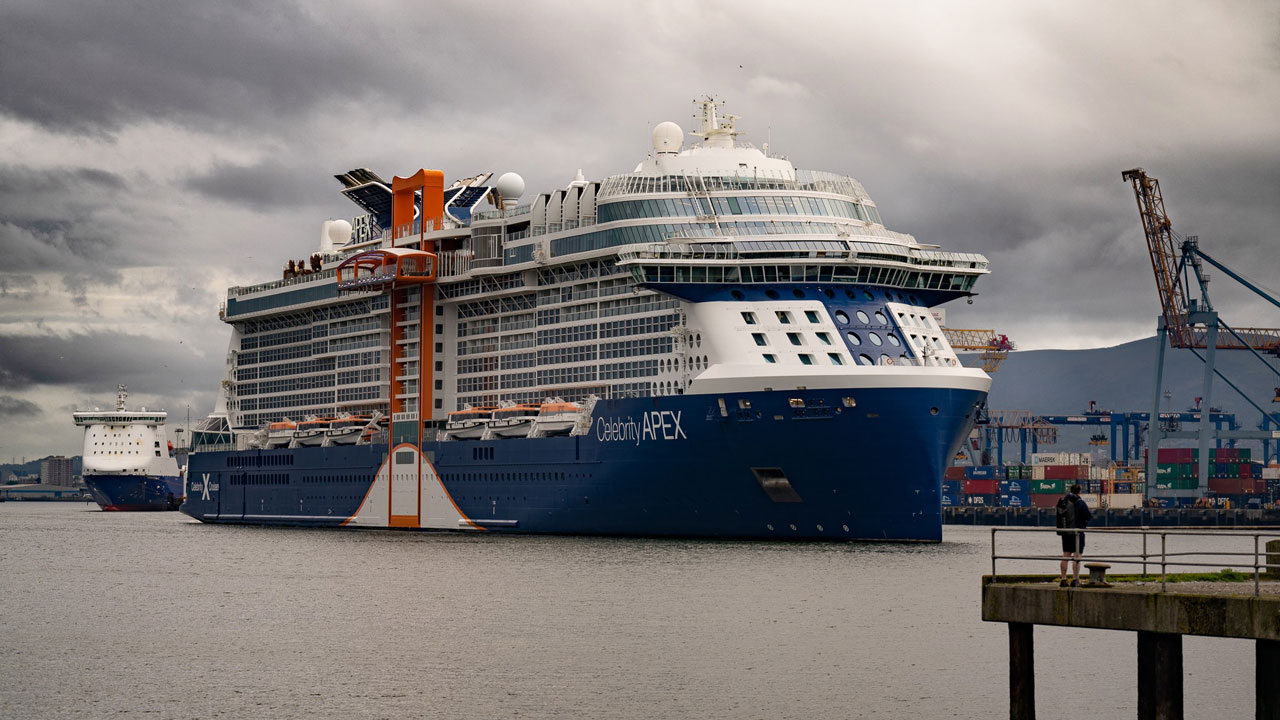 A large cruise ship arriving at the port in Belfast, Northern Ireland