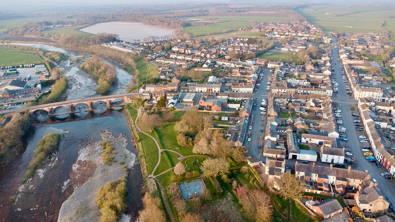 Aerial view of Longtown in Cumbria and the river Esk that passes through