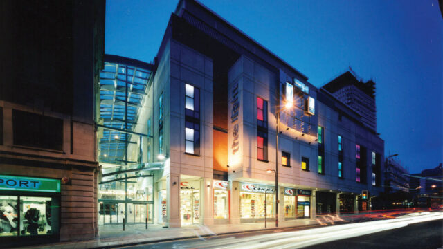 A night time view of a shopping centre