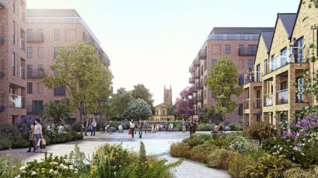 People walking across a courtyard surrounded by retail buildings