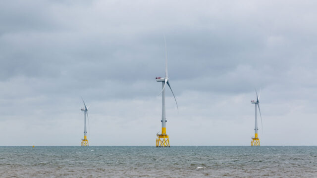 Three windmills part of wind farm off the shores of Aberdeen in the United Kingdom