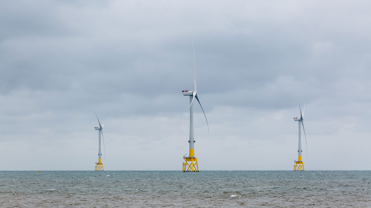 Three windmills part of wind farm off the shores of Aberdeen in the United Kingdom