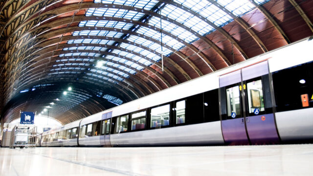 Train at a platform inside railway station