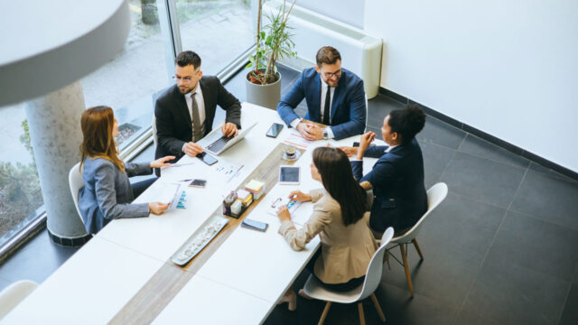 A group of business people in a meeting room