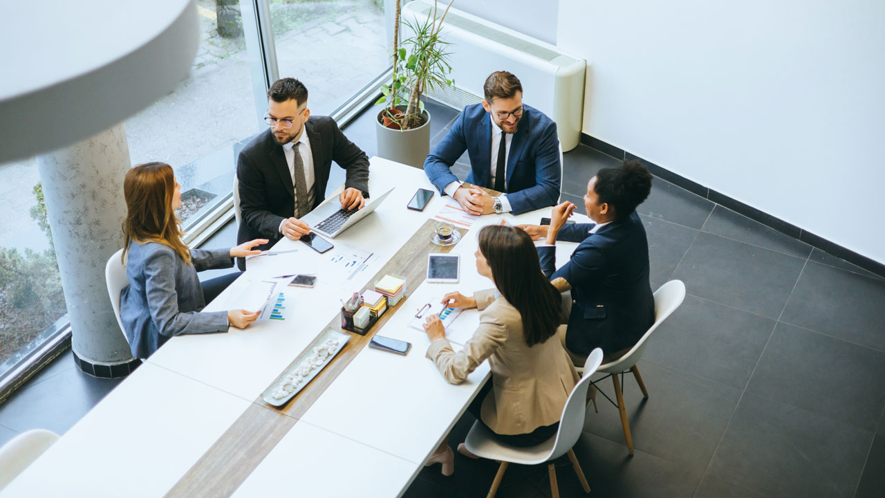 A group of business people in a meeting room