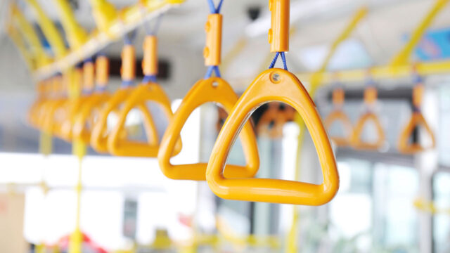 Close up of grab handles on a tram