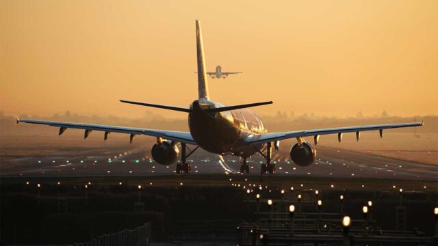 Photograph of an airplane on a runway