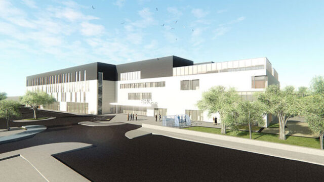 Architectural rendering of a modern building with a sleek design, featuring large windows and landscaped surroundings