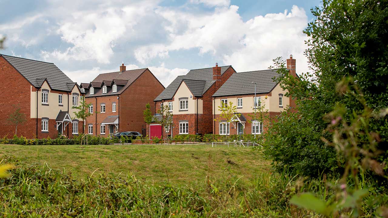 A view of a newbuild housing estate from a medium distance