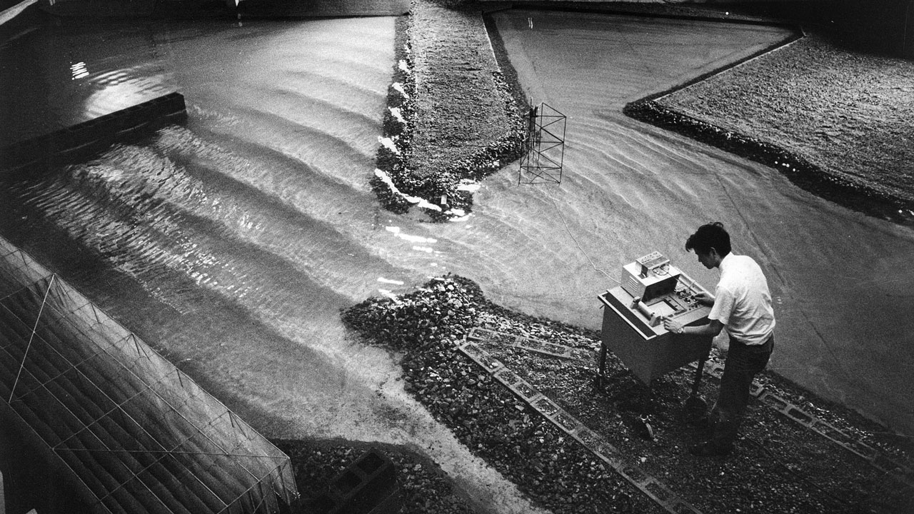 Albert Yuen works on Tetra Tech’s Port of Long Beach wave model project in 1972, simulating the effect of waves on a new large container ship due to dock at the port