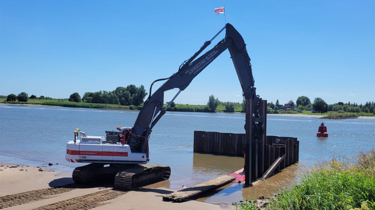 Digger dredging the river