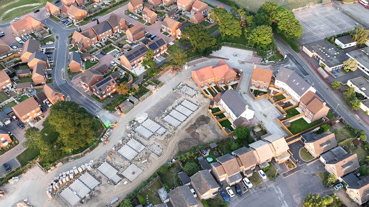 Aerial view of housing development in construction – Priors Hall Park, Corby