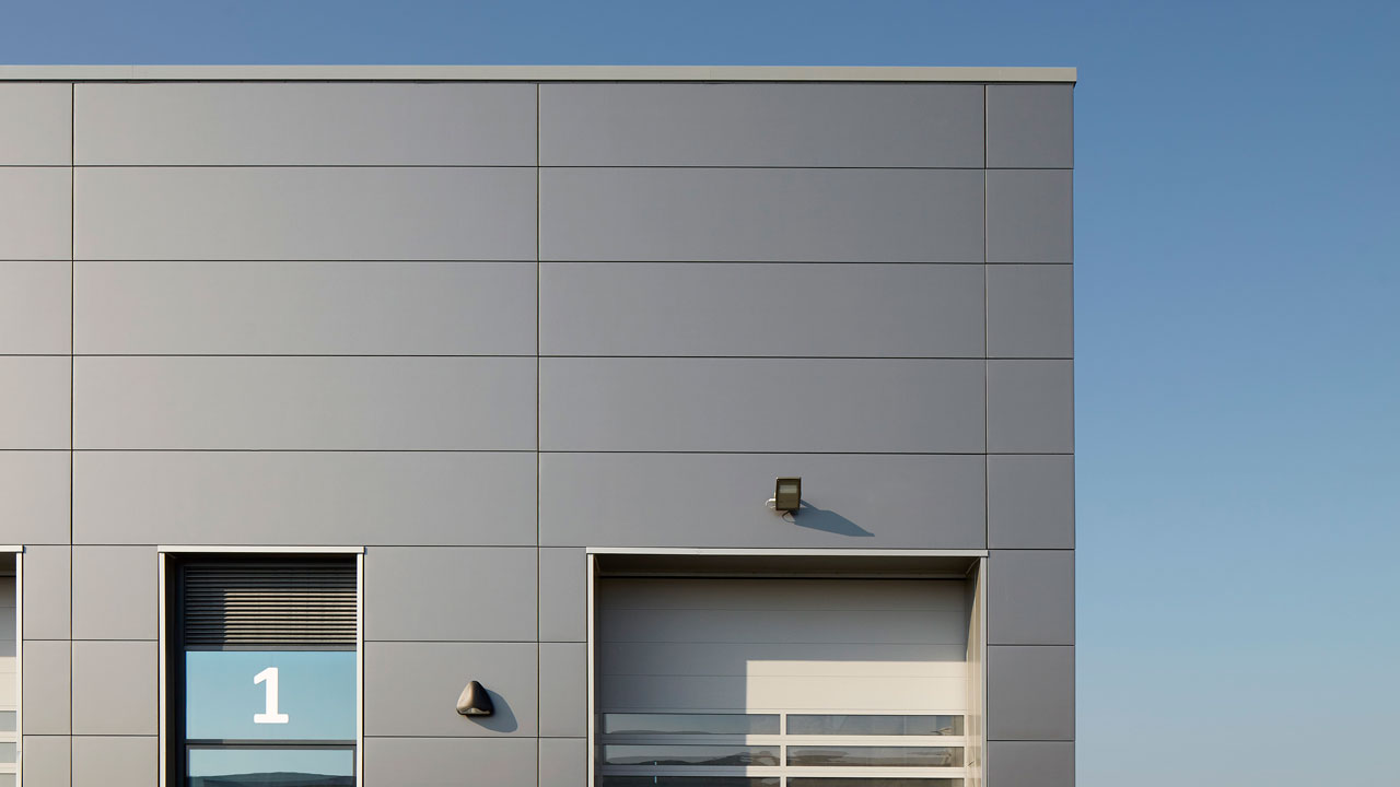 Top corner of a silver modern building